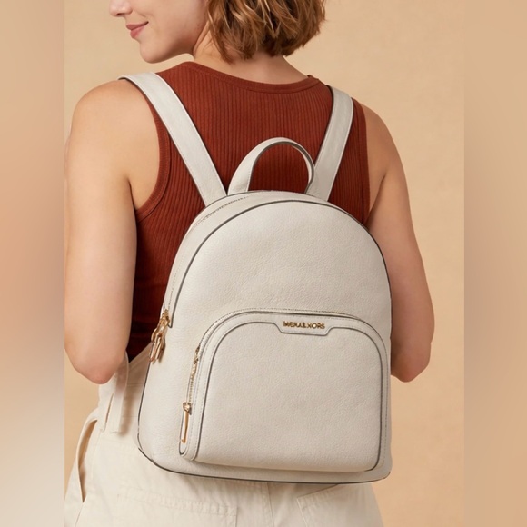 Michael Kors Handbags - Michael Kors Light Cream Backpack